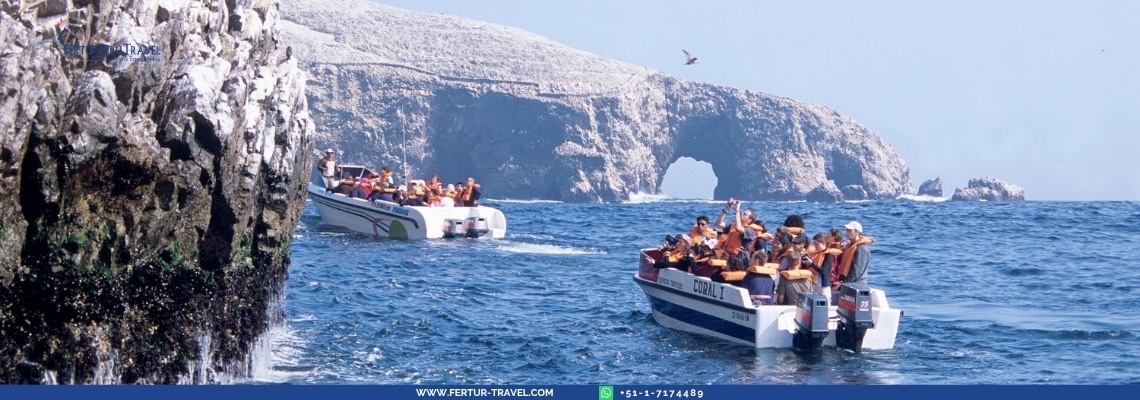 Travelers on tour boats to the Ballestas Islands, Paracas, Peru
